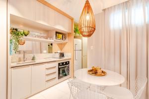 Kuchyň nebo kuchyňský kout v ubytování VT06 Apartamento Quarto/Sala - Vilas do Atlântico