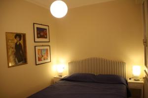 Кровать или кровати в номере Villetta Caterina