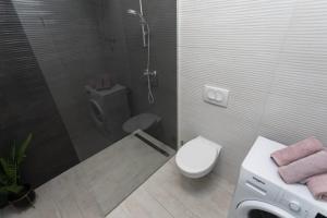 Kúpeľňa v ubytovaní Bloom Apartment + 37 fotografií