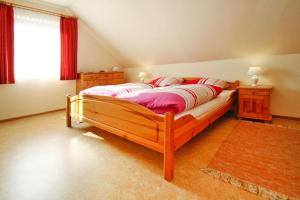 Ein Bett oder Betten in einem Zimmer der Unterkunft Apartment house Schiefertal, Wieda