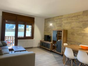 TV a/nebo společenská místnost v ubytování PASSAMANÉ 19 - Canillo - Casco Antiguo Hut 7867