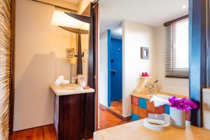 Giường trong phòng chung tại EAST KEYS - East Lagoon Suites