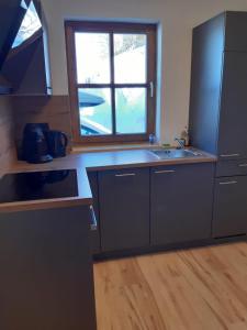 Kuchyňa alebo kuchynka v ubytovaní Apartment Sabrina