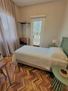 Кровать или кровати в номере Paranaguá Lodge