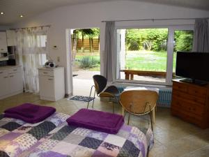 Кухня или мини-кухня в Ferienhaus am Wockersee in Parchim
