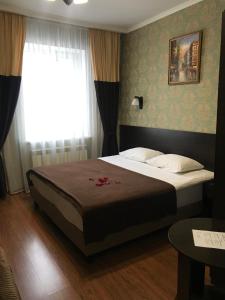 Ένα ή περισσότερα κρεβάτια σε δωμάτιο στο Hotel Malvida