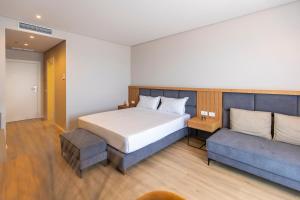 Postel nebo postele na pokoji v ubytování AMR Hotel - Durres