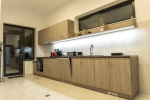 Köök või kööginurk majutusasutuses Pensiunea Qubik Praid