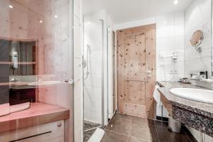 Kúpeľňa v ubytovaní Sporthotel Olymp