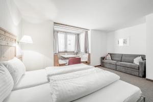 Posteľ alebo postele v izbe v ubytovaní Sporthotel Olymp