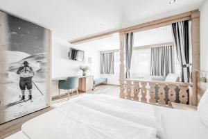 Posteľ alebo postele v izbe v ubytovaní Sporthotel Olymp