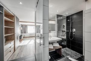 Kúpeľňa v ubytovaní Sporthotel Olymp