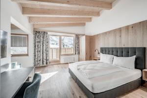 Posteľ alebo postele v izbe v ubytovaní Sporthotel Olymp