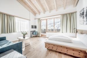 Posteľ alebo postele v izbe v ubytovaní Sporthotel Olymp