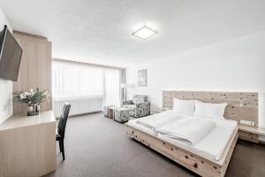 Posteľ alebo postele v izbe v ubytovaní Sporthotel Olymp