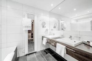 Kúpeľňa v ubytovaní Sporthotel Olymp
