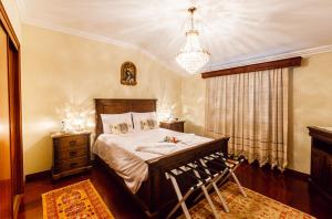 Säng eller sängar i ett rum på Azores Apartment
