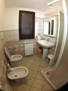 Koupelna v ubytování B&B Su Tintillu + 29 fotografií