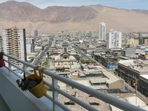 a view of a city from a balcony at Matiz 01 in Iquique