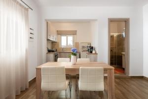 A kitchen or kitchenette at Theros Luxury Apartment