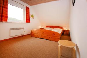 Ein Bett oder Betten in einem Zimmer der Unterkunft Holiday resort in the Müritz National Park, Mirow