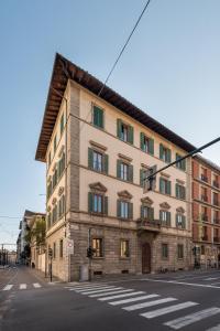 a building on the corner of a street at Florence Feel Apartment in Florence