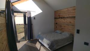 Cama o camas de una habitación en Cabañas Kalfu Lodge