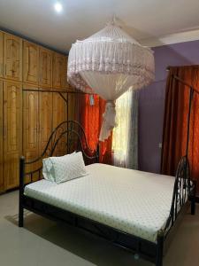 Кровать или кровати в номере Evelina House