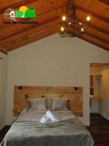 Pousada Vale da Cachoeira客房内的一张或多张床位