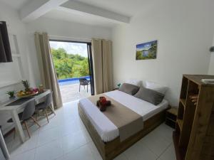 Llit o llits en una habitació de Villa Clémence