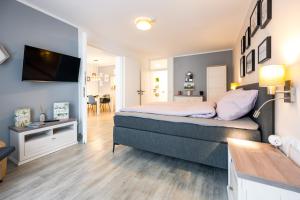 Letto o letti in una camera di BoRa Apartments