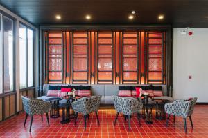 Ein Sitzbereich in der Unterkunft T Heritage Hotel