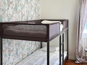 Кровать или кровати в номере 6 person holiday home in HJORTKVARN-By Traum