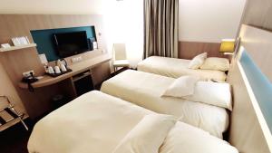 Postel nebo postele na pokoji v ubytování Best Western Marseille Aeroport