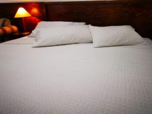Katil atau katil-katil dalam bilik di Hotel CALLI YOLOTL Teotihuacan
