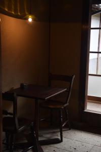 Area soggiorno di Oito 美しい街並みに佇む喫茶と宿
