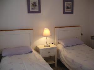 Cama o camas de una habitación en Los Olivos - Zand Properties