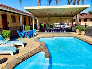 Bazén v ubytování Comfort Inn Glenelg nebo v jeho okolí
