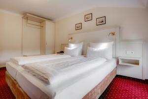 Postel nebo postele na pokoji v ubytování Hotel Fürst Bismarck