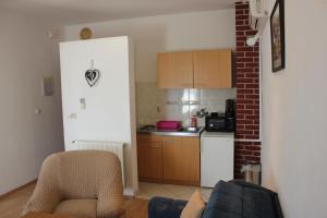 Kuchyňa alebo kuchynka v ubytovaní Guesthouse San Antonio
