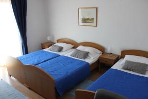 Posteľ alebo postele v izbe v ubytovaní Guesthouse San Antonio