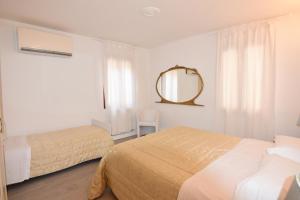 A bed or beds in a room at Da Bruno Homes