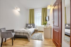 Posteľ alebo postele v izbe v ubytovaní MAGNOLIA III
