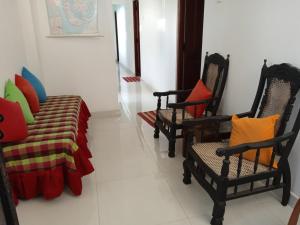 Area soggiorno di Alex Home Stay