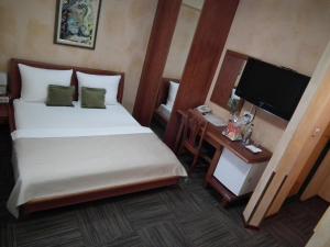 Uma cama ou camas num quarto em Hotel Kerber