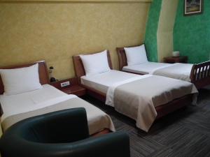 Uma cama ou camas num quarto em Hotel Kerber
