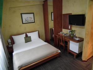 Uma cama ou camas num quarto em Hotel Kerber