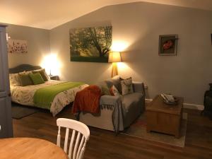 Ένα ή περισσότερα κρεβάτια σε δωμάτιο στο Hillview Lodge