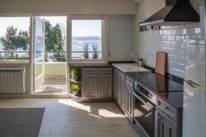 Kuchyň nebo kuchyňský kout v ubytování Apartamento Playa Lago