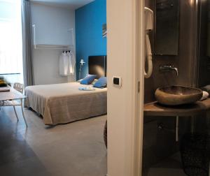 Voodi või voodid majutusasutuse Hotel Marina Piccola toas